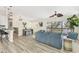 Open floorplan concept showing the kitchen, living and dining areas at 501 Key Royale Dr, Holmes Beach, FL 34217