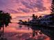 Waterfront homes offer scenic views, boat docks, and easy access to the water, perfect for boating and enjoying stunning sunrises at 501 Key Royale Dr, Holmes Beach, FL 34217