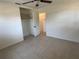 Bright bedroom featuring tile floor and closet space at 5030 Lahaina Dr, Sarasota, FL 34232