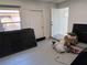 Garage offering versatile space for parking and storage, with access to the interior of the home at 5030 Lahaina Dr, Sarasota, FL 34232