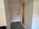 Hallway with neutral paint, highlighting clean lines and access to other rooms of the house at 5030 Lahaina Dr, Sarasota, FL 34232
