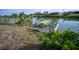 Scenic waterfront dock with space to entertain and enjoy tranquil views of the peaceful canal at 512 Shamrock Blvd, Venice, FL 34293
