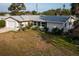 Charming single-story home with an attached garage, and landscaped yard at 512 Shamrock Blvd, Venice, FL 34293