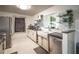 Bright kitchen with stainless steel appliances, granite countertops, and plenty of storage space at 512 Shamrock Blvd, Venice, FL 34293