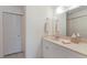 Bathroom featuring pink vanity and a large mirror at 536 Lakeside Dr # 0, Bradenton, FL 34210