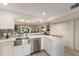 Bright kitchen featuring stainless steel appliances with view to living area at 536 Lakeside Dr # 0, Bradenton, FL 34210