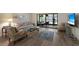 Comfortable living room with stylish furniture and access to the lanai at 536 Lakeside Dr # 0, Bradenton, FL 34210