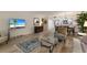 Cozy living space showcasing stylish decor and connection to dining and kitchen at 536 Lakeside Dr # 0, Bradenton, FL 34210