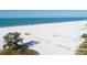 Scenic aerial view of a beach with white sand and blue water at 5800 Hollywood Blvd # 312, Sarasota, FL 34231
