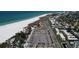 This aerial view captures the beautiful Siesta Key Beach and vibrant community at 5800 Hollywood Blvd # 312, Sarasota, FL 34231