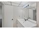 Bathroom vanity area features decorative lighting and a large mirror at 5800 Hollywood Blvd # 312, Sarasota, FL 34231