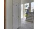 Building exterior with stairs and a door with the number 311 at 5800 Hollywood Blvd # 312, Sarasota, FL 34231