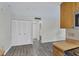 Corner of kitchen adjacent to a pantry with louvered doors at 5800 Hollywood Blvd # 312, Sarasota, FL 34231