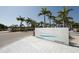 Signage for Siesta Beach in front of tall palm trees at 5800 Hollywood Blvd # 312, Sarasota, FL 34231