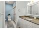Tidy bathroom featuring granite countertops and a walk-in shower at 6218 29Th W Ave # 6218, Bradenton, FL 34209