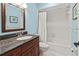 Fresh bathroom featuring a tub-shower, and granite countertop vanity at 6218 29Th W Ave # 6218, Bradenton, FL 34209