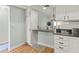 Kitchen snack bar with a view of the living room at 6218 29Th W Ave # 6218, Bradenton, FL 34209