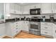 Well-equipped kitchen with stainless steel appliances, ample storage, and stylish countertops at 6218 29Th W Ave # 6218, Bradenton, FL 34209