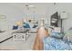 Bright living room with comfortable seating, wood floors, and natural light at 6218 29Th W Ave # 6218, Bradenton, FL 34209