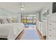 Sunlit main bedroom featuring sliding glass doors to the outdoors at 6218 29Th W Ave # 6218, Bradenton, FL 34209