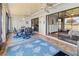 Enclosed patio features tile flooring, ceiling fans, and glass doors to the living area and bedroom at 6218 29Th W Ave # 6218, Bradenton, FL 34209