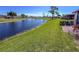 Relaxing water view and manicured lawns surround this beautiful home at 6218 29Th W Ave # 6218, Bradenton, FL 34209
