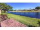 Scenic water view from the patio with lush green landscaping and bright blue skies at 6218 29Th W Ave # 6218, Bradenton, FL 34209