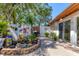 Cozy patio with brick flooring, garden, and decorative accents for outdoor relaxation and entertainment at 6304 Pelican Dr, Bradenton, FL 34210