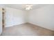Neutral bedroom with carpet and a white door at 6405 99Th E St, Bradenton, FL 34202