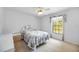 Bedroom with a floral comforter and a window providing natural light at 6405 99Th E St, Bradenton, FL 34202