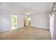 Spacious bedroom with neutral carpet and access to ensuite bathroom and additional room at 6405 99Th E St, Bradenton, FL 34202