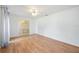 Spacious living room with hardwood floors, neutral walls, and abundant natural light at 6405 99Th E St, Bradenton, FL 34202