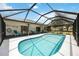 Sparkling backyard pool features a screened enclosure and a spacious deck area at 6405 99Th E St, Bradenton, FL 34202