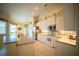Bright and modern kitchen features spacious counters and stainless steel appliances at 6415 67Th E St, Bradenton, FL 34203