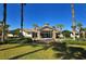 Attractive community clubhouse framed by palm trees and manicured landscaping at 6931 Brier Creek Ct, Lakewood Ranch, FL 34202