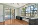 Bright home office with lots of natural light, and access to outdoor living space, including a grill and pool at 6931 Brier Creek Ct, Lakewood Ranch, FL 34202