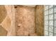Tile shower featuring a glass block wall and built-in seat at 6931 Brier Creek Ct, Lakewood Ranch, FL 34202