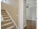 Carpeted staircase with access to the upstairs living space at 6931 Brier Creek Ct, Lakewood Ranch, FL 34202