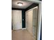 Welcoming foyer features a closet, neutral tile floor, and ample natural light at 750 N Tamiami Trl # 208, Sarasota, FL 34236