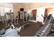 Modern gym with weights, machines, mirrors, and ample workout space at 750 N Tamiami Trl # 208, Sarasota, FL 34236