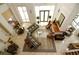 Spacious lobby with high ceilings, comfortable seating, and elegant decor at 750 N Tamiami Trl # 208, Sarasota, FL 34236