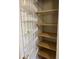 Pantry with wire shelving, providing ample storage solutions at 750 N Tamiami Trl # 208, Sarasota, FL 34236