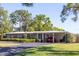 Charming single-story home with a well-manicured lawn and inviting curb appeal at 91 39Th Street Nw Ct, Bradenton, FL 34205