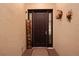 Elegant front door with decorative glass sidelights and 'Welcome' sign at 9774 Highland Park Pl, Palmetto, FL 34221