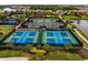 Aerial view of the community tennis courts, showcasing multiple well-maintained courts at 9774 Highland Park Pl, Palmetto, FL 34221