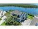Overhead view of the home and lush landscaping overlooking the water at 12 Tidy Island Blvd, Bradenton, FL 34210