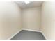 Empty room features light walls and grey floors at 12 Tidy Island Blvd, Bradenton, FL 34210