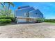 Spacious two-car garage and paver driveway with access to the beautiful waterfront home at 12 Tidy Island Blvd, Bradenton, FL 34210