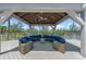 Gazebo with lake views and comfortable seating at 12 Tidy Island Blvd, Bradenton, FL 34210