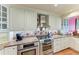 Updated kitchen featuring granite counters, stainless appliances, and ample cabinet space at 12 Tidy Island Blvd, Bradenton, FL 34210